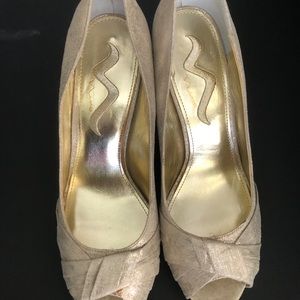 Soft Gold metallic heels with pleated crossed open toe.
